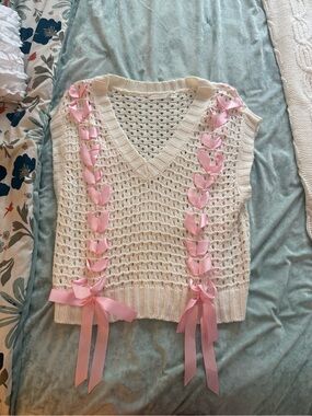 Altar'd State Cream Open-Knit Sleeveless Vest with Pink Ribbon Accent